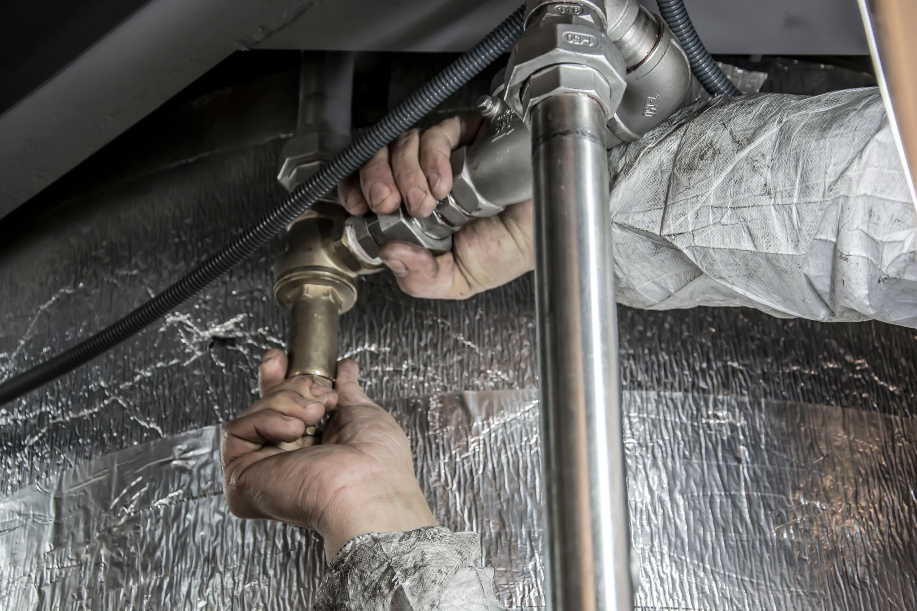 A plumber at work